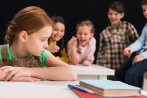 Sikap Profesional Guru dalam Menghadapi Murid dengan Masalah Pribadi dan Akademik 1 depositphotos 345697060 stock photo selective focus upset schoolkid sitting